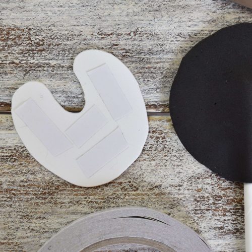 add double-sided tape on the white foam part