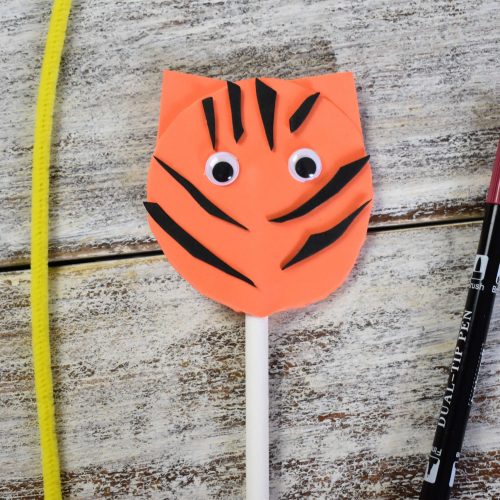 add eyes and stripes to the tiger