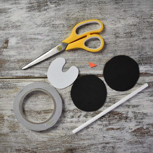 cut circles out for foam penguin